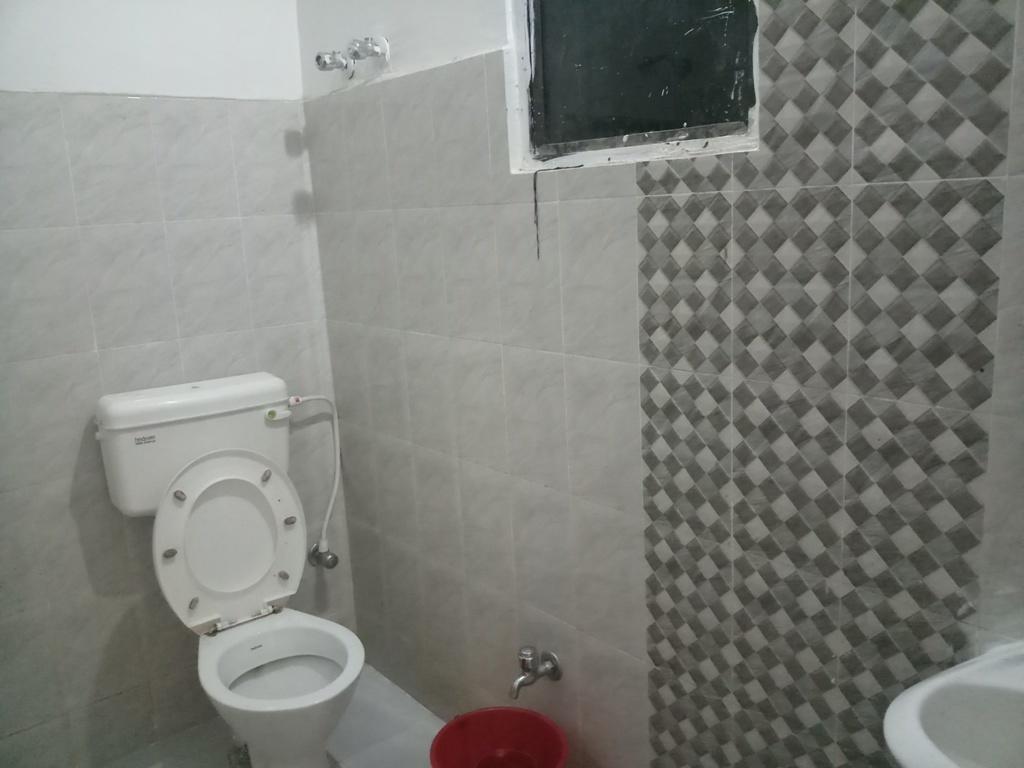 Sunrise Guest House บูบันเนสชวาร์ ภายนอก รูปภาพ